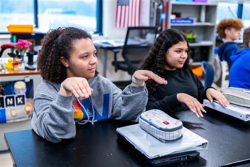 Students do a science experiment